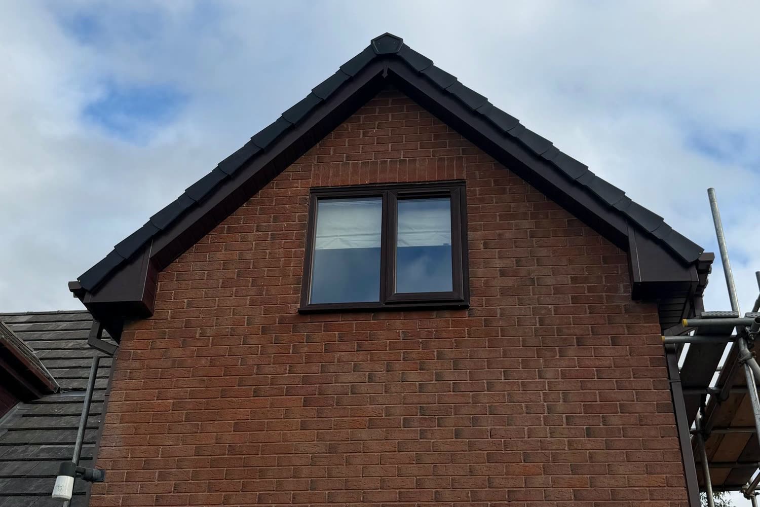 Brick gable with new fascia, soffit, bargeboards, box ends and dry verge